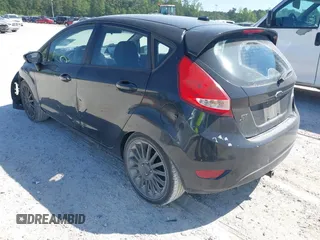 2013 Ford Fiesta SE with VIN 3FADP4EJ3DM218898, listed as a IAAI auction lot 42038436 with 177,193 mi miles and . Bid and sale history available at DreamBid. Image 3.