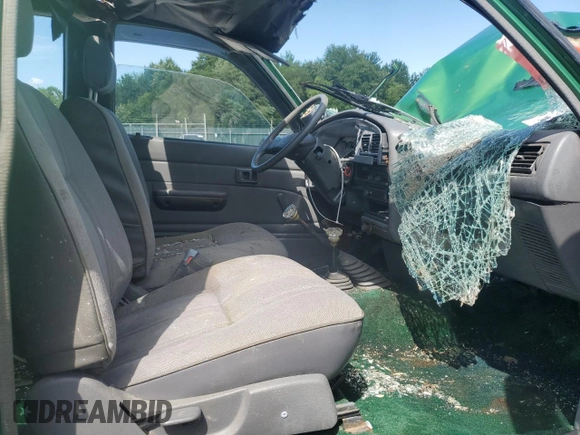 1991 Toyota Pickup z VIN JT4RN13P9M6023450, wystawiony jako Copart lot #61621235 z przebiegiem 599 120 mil mil oraz Szkoda całkowita • Salvage title. Historia ofert i sprzedaży dostępna na DreamBid. Obrazek 7.