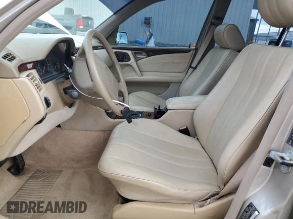 1998 Mercedes-Benz E-Class with VIN WDBJH65F7WA546101, listed as a Copart auction lot 47098945 with 227,453 mi miles and Salvage Title. Bid and sale history available at carsss.com. Image 7.