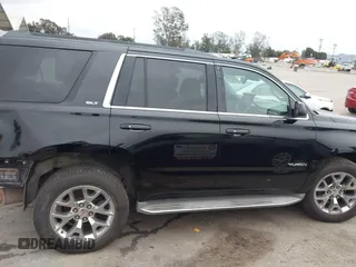 2015 GMC Yukon SLT with VIN 1GKS1BKC3FR129173, listed as a IAAI auction lot 41795585 with 97,893 mi miles. Bid and sale history available at carsss.com. Image 14.