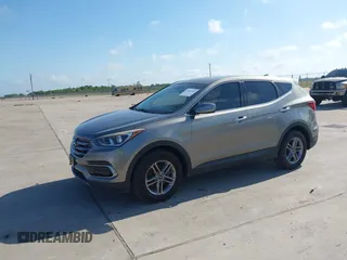 2017 Hyundai Santa Fe 2.4L z VIN 5XYZTDLB7HG444033, wystawiony jako IAAI lot #42263907 z przebiegiem 107 454 mil mil oraz . Historia ofert i sprzedaży dostępna na DreamBid. Obrazek 17.