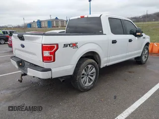 2018 Ford F-150 XL with VIN 1FTEW1E59JKD99284, listed as a IAAI auction lot 41203530 with 153,800 mi miles. Bid and sale history available at carsss.com. Image 4.