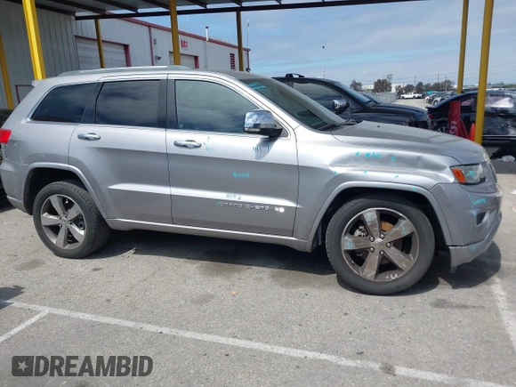 2014 Jeep Grand Cherokee Overland with VIN 1C4RJECG0EC291048, listed as a IAAI auction lot 41883941 with 81,871 mi miles. Bid and sale history available at carsss.com. Image 13.