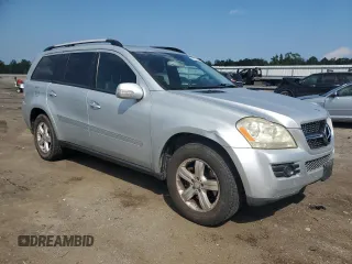 2007 Mercedes-Benz GL-Class with VIN 4JGBF71E77A141285, listed as a Copart auction lot 69225694 with 128,827 mi miles and Salvage Title. Bid and sale history available at carsss.com. Image 4.