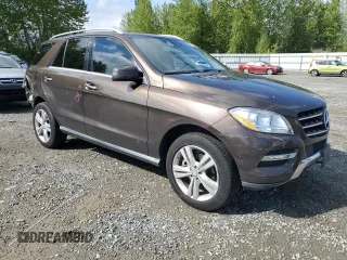 2015 Mercedes-Benz M 350 with VIN 4JGDA5JB9FA553014, listed as a Copart auction lot 55325335 with 122,313 mi miles and Salvage Title. Bid and sale history available at DreamBid. Image 4.