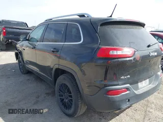 2015 Jeep Cherokee North with VIN 1C4PJMCS7FW544792, listed as a IAAI auction lot 41801573 with 140,575 mi miles. Bid and sale history available at carsss.com. Image 3.