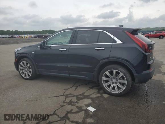 2021 Cadillac XT4 AWD Luxury with VIN 1GYFZBR4XMF014647, listed as a Copart auction lot 63800444 with 49,724 mi miles and Salvage Title. Bid and sale history available at carsss.com. Image 2.