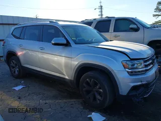 2018 Volkswagen Atlas SE with VIN 1V2CP2CA6JC595850, listed as a IAAI auction lot 41344485 with 86,469 mi miles and . Bid and sale history available at DreamBid. Image 1.