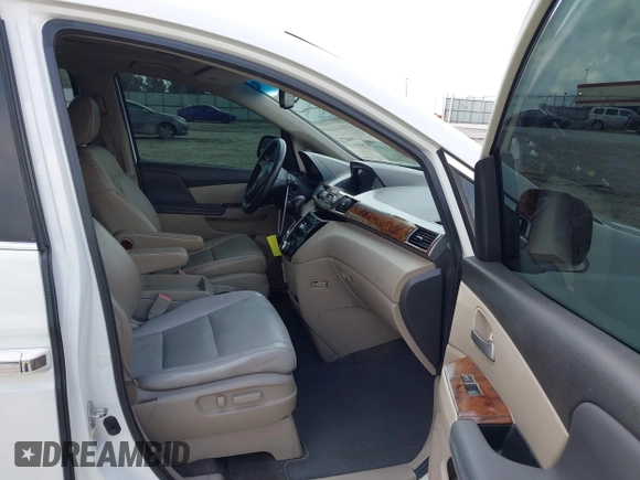 2011 Honda Odyssey EX-L with VIN 5FNRL5H67BB011070, listed as a IAAI auction lot 42491685 with 200,671 mi miles and . Bid and sale history available at DreamBid. Image 5.