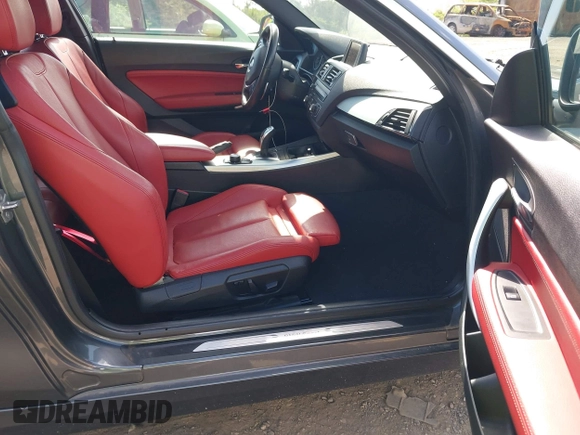 2014 BMW 2 Series 228i with VIN WBA1F5C59EV246205, listed as a IAAI auction lot 42219390 with 142,532 mi miles and . Bid and sale history available at DreamBid. Image 5.