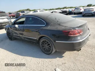 2014 Volkswagen CC R-Line with VIN WVWBN7AN7EE537598, listed as a Copart auction lot 73974244 with 139,476 mi miles and Salvage Title. Bid and sale history available at carsss.com. Image 2.