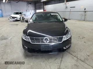 2013 Volkswagen CC Sport z VIN WVWAP7AN3DE517918, wystawiony jako Copart lot #55080285 z przebiegiem 56 408 mil mil oraz Szkody całkowita. Historia ofert i sprzedaży dostępna na DreamBid. Obrazek 5.