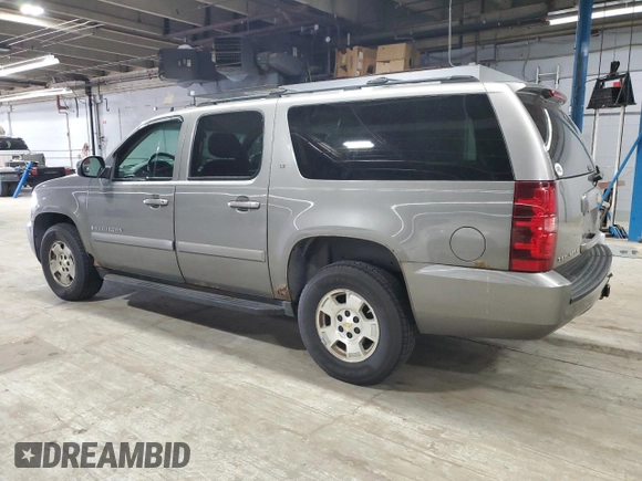 2007 Chevrolet Suburban LTZ with VIN 1GNFK163X7J231365, listed as a Copart auction lot 60885135 with 208,687 mi miles and Salvage title. Bid and sale history available at DreamBid. Image 2.