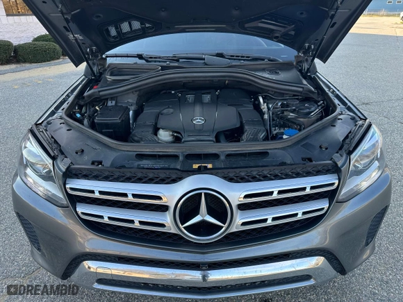 2018 Mercedes-Benz GLS with VIN 4JGDF6EE2JB005743, listed as a Copart auction lot 54836755 with 148,583 mi miles and Clean Title. Bid and sale history available at carsss.com. Image 7.