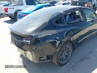 2018 Tesla Model 3 Long Range Battery with VIN 5YJ3E1EA7JF098632, listed as a IAAI auction lot 42002181 with 73,371 mi miles and . Bid and sale history available at DreamBid. Image 20.