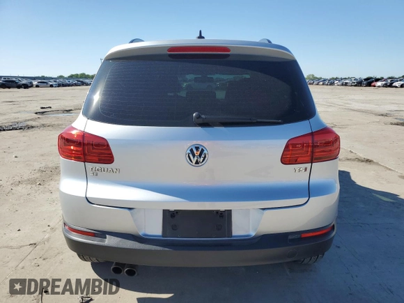 2017 Volkswagen Tiguan S with VIN WVGAV7AX3HK008793, listed as a Copart auction lot 54086385 with 82,400 mi miles and Salvage Title. Bid and sale history available at DreamBid. Image 6.