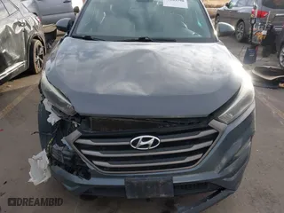 2016 Hyundai Tucson SE with VIN KM8J3CA47GU128085, listed as a IAAI auction lot 41109798 with 156,861 mi miles. Bid and sale history available at carsss.com. Image 12.