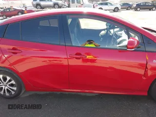 2020 Toyota Prius LE with VIN JTDKARFP8L3154280, listed as a IAAI auction lot 42405444 with 57,134 mi miles and . Bid and sale history available at DreamBid. Image 14.