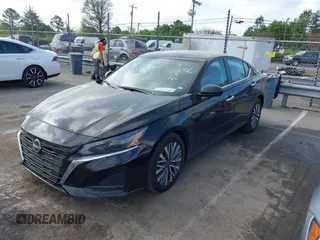 2024 Nissan Altima SV with VIN 1N4BL4DV3RN409614, listed as a IAAI auction lot 41970274 with 23,111 mi miles and . Bid and sale history available at DreamBid. Image 2.