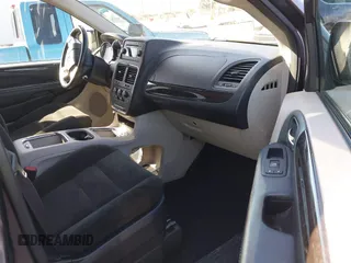2016 Dodge Grand Caravan SXT with VIN 2C4RDGCG0GR333344, listed as a IAAI auction lot 41988558 with 79,454 mi miles and . Bid and sale history available at DreamBid. Image 5.
