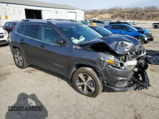 2019 Jeep Cherokee Limited with VIN 1C4PJMDX3KD188941, listed as a Copart auction lot 49853385 with 99,999 mi miles and Clean Title. Bid and sale history available at carsss.com. Image 4.