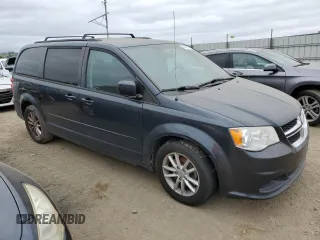 2014 Dodge Grand Caravan SXT with VIN 2C4RDGCG5ER267354, listed as a Copart auction lot 54548955 with 145,971 mi miles and Clean Title. Bid and sale history available at DreamBid. Image 4.