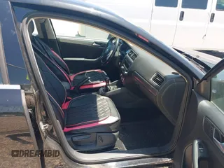 2014 Volkswagen Jetta TDI w/Premium with VIN 3VW3L7AJ6EM420044, listed as a IAAI auction lot 42569620 with 143,482 mi miles and . Bid and sale history available at DreamBid. Image 5.