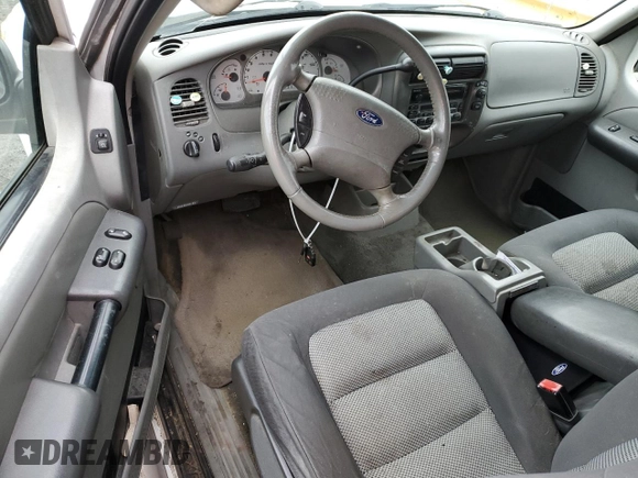 2003 Ford Explorer Sport XLS with VIN 1FMYU60E63UA24544, listed as a Copart auction lot 53888765 with 263,249 mi miles and Salvage title. Bid and sale history available at DreamBid. Image 8.