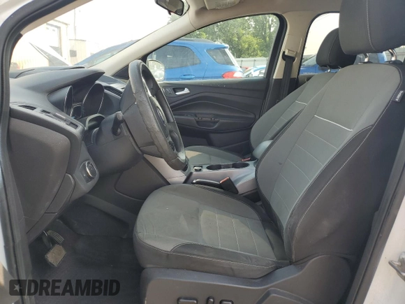 2014 Ford Escape SE z VIN 1FMCU9GX5EUC60849, wystawiony jako Copart lot #60498575 z przebiegiem Nie podano mil oraz Szkoda całkowita • Salvage title. Historia ofert i sprzedaży dostępna na DreamBid. Obrazek 7.
