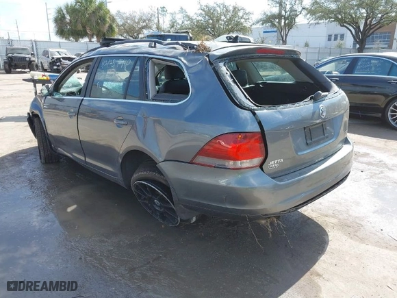 2014 Volkswagen Jetta SportWagen TDI w/Sunroof & Nav with VIN 3VWPL7AJ2EM602051, listed as a IAAI auction lot 41553277 with 114,981 mi miles. Bid and sale history available at carsss.com. Image 3.