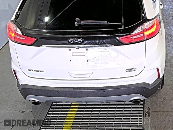 2019 Ford Edge SEL with VIN 2FMPK3J9XKBC37759, listed as a IAAI auction lot 42666643 with 103,812 mi miles and . Bid and sale history available at DreamBid. Image 25.