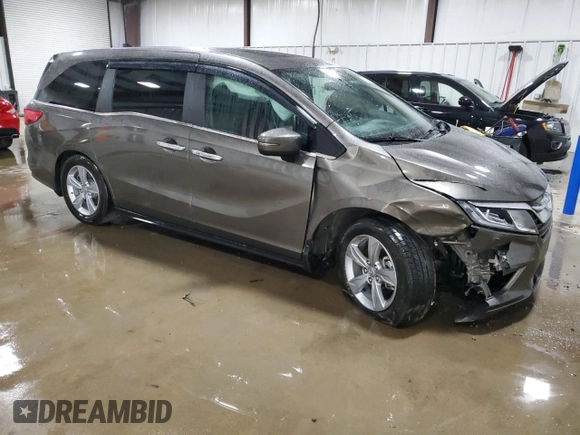 2018 Honda Odyssey EX-L z VIN 5FNRL6H77JB013494, wystawiony jako Copart lot #56348745 z przebiegiem 21 368 mil mil oraz Szkoda całkowita • Salvage title. Historia ofert i sprzedaży dostępna na DreamBid. Obrazek 4.