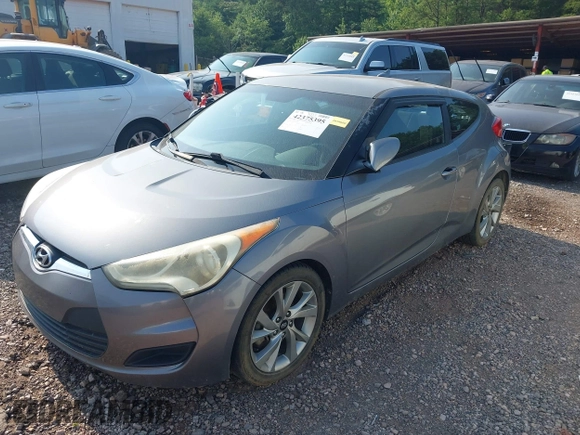 2016 Hyundai Veloster z VIN KMHTC6AD8GU277003, wystawiony jako IAAI lot #42375395 z przebiegiem 166 583 mil mil oraz . Historia ofert i sprzedaży dostępna na DreamBid. Obrazek 2.