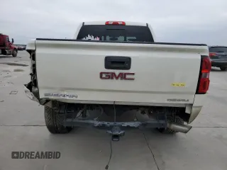 2014 GMC Sierra 1500 Denali z VIN 3GTP1WEC3EG323320, wystawiony jako Copart lot #81966444 z przebiegiem Nie podano mil oraz Szkoda całkowita • Salvage title. Historia ofert i sprzedaży dostępna na DreamBid. Obrazek 6.