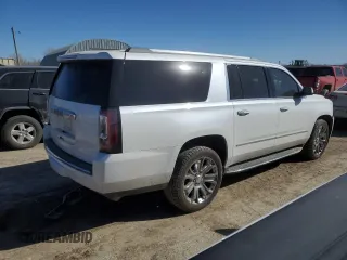2016 GMC Yukon XL Denali with VIN 1GKS2HKJ5GR225936, listed as a Copart auction lot 49353985 with 207,658 mi miles and Salvage Title. Bid and sale history available at DreamBid. Image 3.