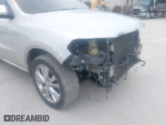 2012 Dodge Durango Citadel with VIN 1C4SDJET5CC211252, listed as a IAAI auction lot 41739657 with 140,296 mi miles and . Bid and sale history available at DreamBid. Image 6.