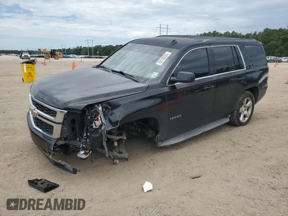 2015 Chevrolet Tahoe LS with VIN 1GNSCAKC5FR308614, listed as a Copart auction lot 60138355 with 145,797 mi miles and Salvage title. Bid and sale history available at DreamBid. Image 1.