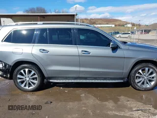 2016 Mercedes-Benz GL with VIN 4JGDF6EE3GA633180, listed as a IAAI auction lot 41623280 with 120,294 mi miles. Bid and sale history available at carsss.com. Image 14.