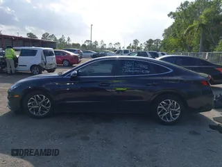 2023 Hyundai Sonata SEL z VIN KMHL64JA0PA289889, wystawiony jako IAAI lot #41931833 z przebiegiem 24 070 mil mil oraz . Historia ofert i sprzedaży dostępna na DreamBid. Obrazek 14.
