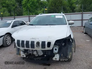 2021 Jeep Cherokee Altitude with VIN 1C4PJLLB8MD103661, listed as a IAAI auction lot 39517776 with 95,292 mi miles. Bid and sale history available at carsss.com. Image 6.