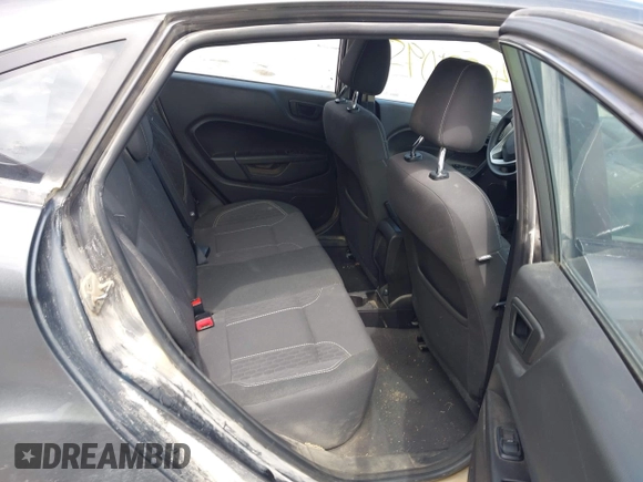 2017 Ford Fiesta SE z VIN 3FADP4BJ2HM134825, wystawiony jako IAAI lot #42331095 z przebiegiem 117 794 mil mil oraz . Historia ofert i sprzedaży dostępna na DreamBid. Obrazek 8.