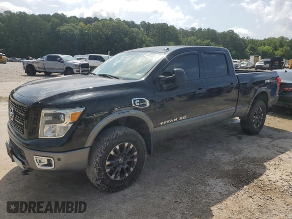 2016 Nissan Titan Platinum Reserve with VIN 1N6BA1F40GN512437, listed as a Copart auction lot 63521325 with 203,879 mi miles and Clean title. Bid and sale history available at DreamBid. Image 1.