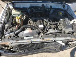 1995 Jeep Cherokee Sport with VIN 1J4FJ68S0SL646747, listed as a Copart auction lot 48772675 with 239,834 mi miles and Salvage title. Bid and sale history available at DreamBid. Image 12.