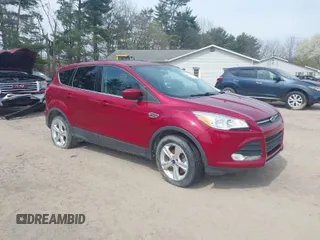 2013 Ford Escape SE with VIN 1FMCU9GX4DUC33172, listed as a IAAI auction lot 41980888 with 103,330 mi miles. Bid and sale history available at carsss.com. Image 1.