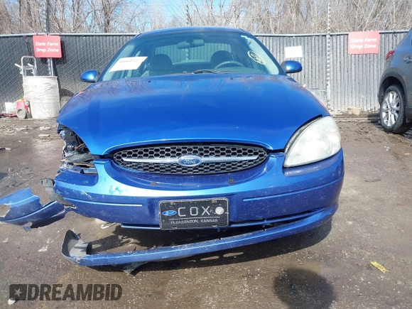 2003 Ford Taurus SE Standard with VIN 1FAFP53233G208763, listed as a IAAI auction lot 41661923 with 127,830 mi miles. Bid and sale history available at carsss.com. Image 13.