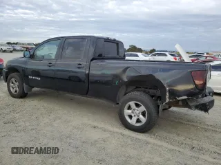 2008 Nissan Titan with VIN 1N6BA07F88N309789, listed as a Copart auction lot 77879284 with 213,835 mi miles and Salvage title. Bid and sale history available at DreamBid. Image 2.