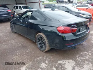 2015 BMW 4 Series 428i xDrive with VIN WBA3N5C56FK198340, listed as a IAAI auction lot 42153190 with 96,054 mi miles and . Bid and sale history available at DreamBid. Image 3.