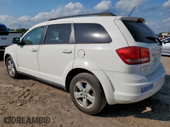 2013 Dodge Journey SE z VIN 3C4PDCAB0DT531874, wystawiony jako Copart lot #59524405 z przebiegiem 125 230 mil mil oraz Czysty tytuł • Clean title. Historia ofert i sprzedaży dostępna na DreamBid. Obrazek 2.