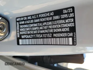 2024 Porsche Taycan z VIN WP0AA2Y17RSA10152, wystawiony jako Copart lot #83117234 z przebiegiem Nie podano mil oraz Szkody całkowita. Historia ofert i sprzedaży dostępna na DreamBid. Obrazek 12.