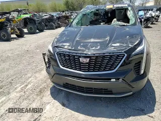 2021 Cadillac XT4 FWD Premium Luxury с VIN 1GYFZCR4XMF004996, выставлен на аукционе Copart как лот 61270355 с пробегом Не указан миль и Списание • Salvage title. История ставок и продаж доступна на DreamBid. Изображение 14.